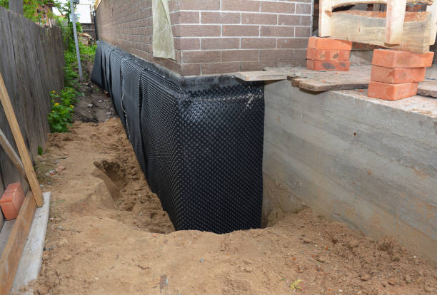 SJ Waterproofing Pros technician performing targeted Waterproofing assessment in Bridgeport, PA